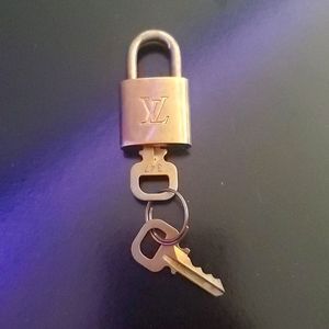 Louis Vuitton 347 brass lock